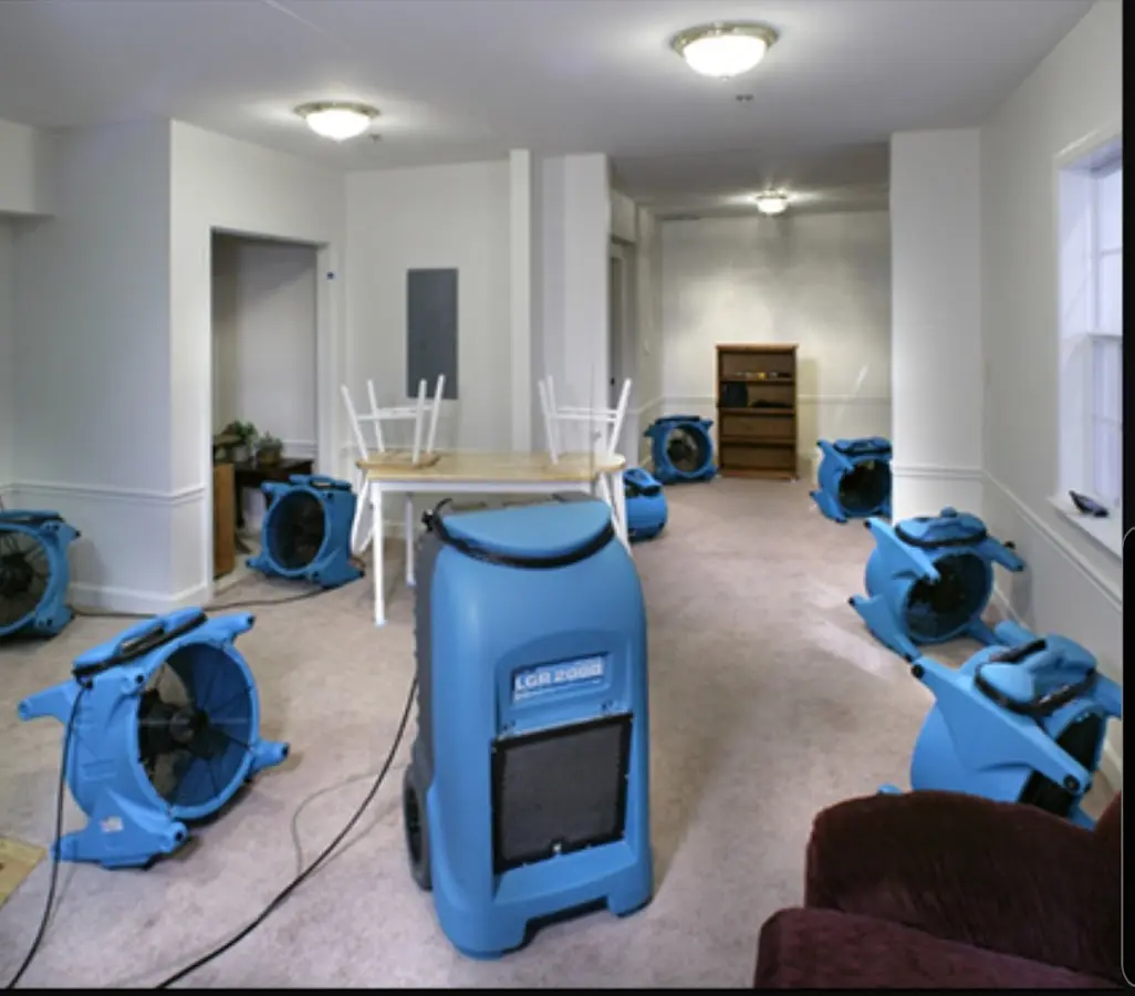 Air movers and dehumidifier setup for Water Damage Restoration in El Rio